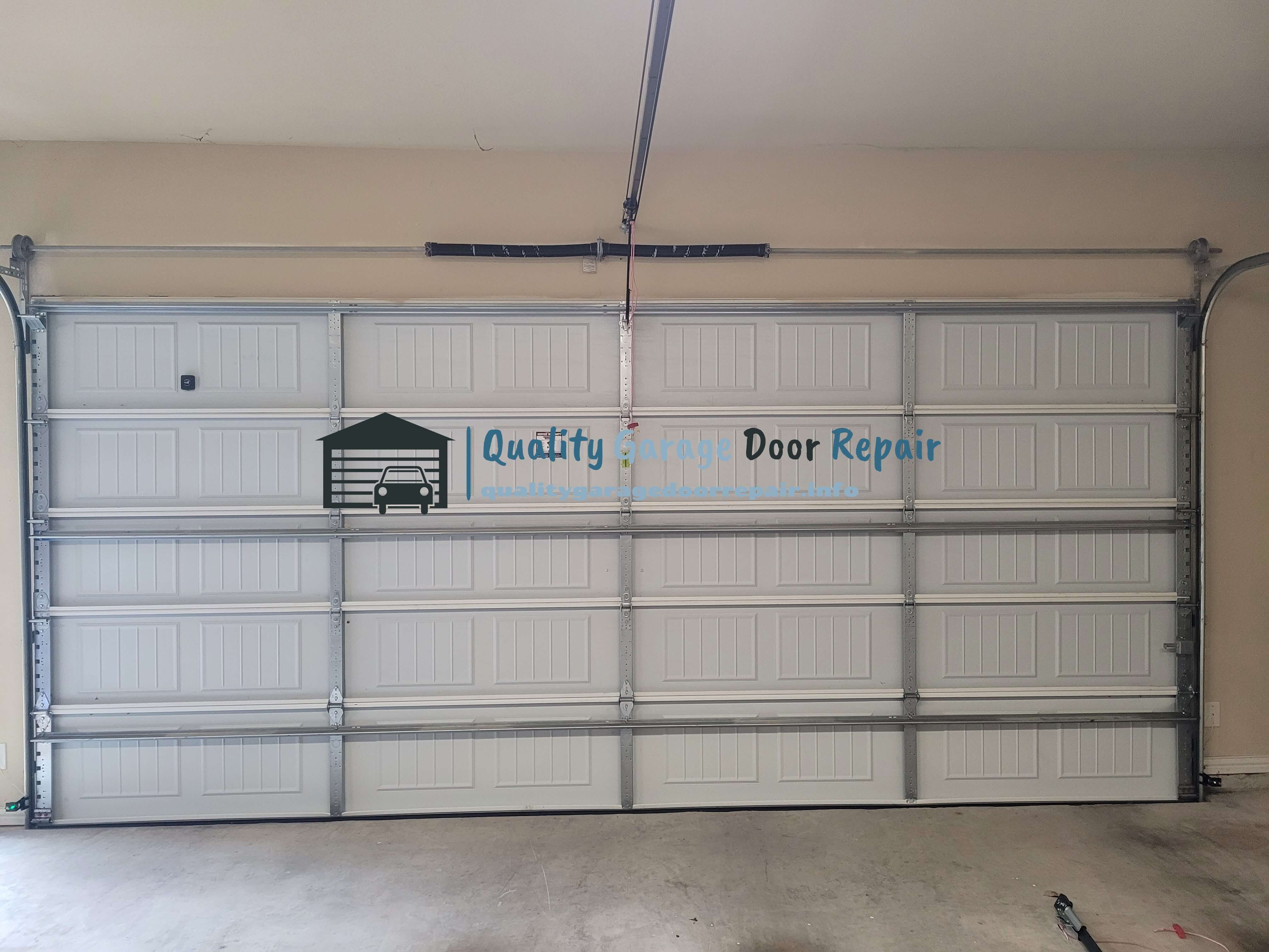 new-garage-door-torsion-spring-repair